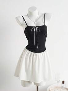 Elamini 四季皆宜的圆领蝴蝶结针织拼接撞色修身短裙 + 黑色针织白色蕾丝边撞色长袖开衫 女士两件套 - 黑色 - 查看 3