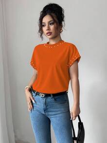 Elenzga 女士黑色圆领短袖T恤，饰有泡泡珍珠 - 橘色 - 查看 3