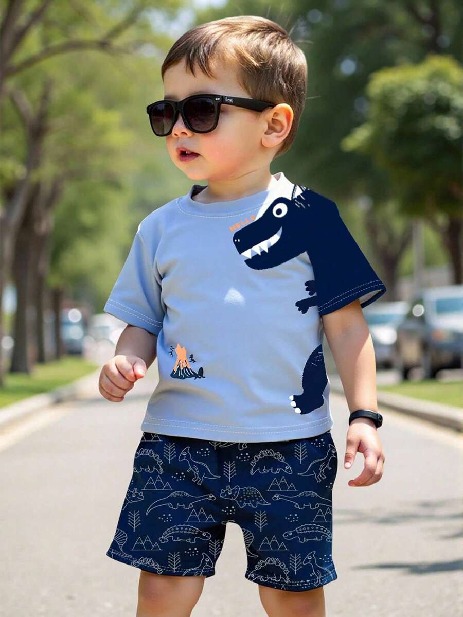 SHEIN 1 套幼儿男童卡通短袖 T 恤和短裤套装,T 恤印有恐龙和“HELLO”图案,短裤印满恐龙线条,适合日常玩耍的可爱服装,春夏季 - 彩色 - 查看 1