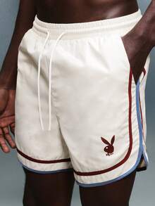 PLAYBOY X SUMWON Bunny Logo Swim Trunks With Contrast Trim Detail And Drawstring Waistband For Beach Summer Swimming Pool Activities - Apricot - View 1