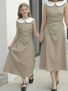 SHEIN Tween Girl Fashionable & Elegant Khaki Dress With White Peter Pan Collar Sleeveless Cinched Waist A-Line Midi Dress Tween Girls Casual Chic Commuter Elegant Khaki Dress - Khaki - View 9