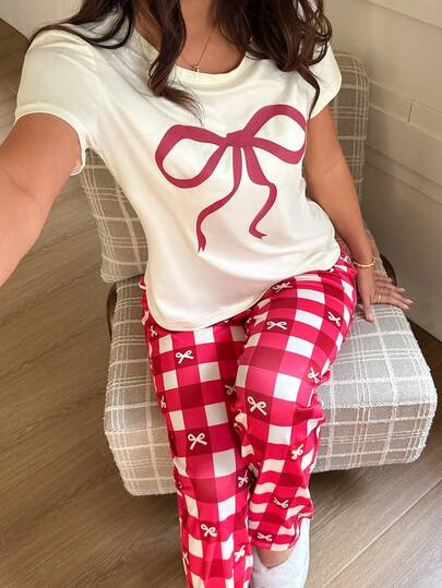 SHEIN Conjunto de pijama casual y cómodo para mujer con camiseta estampada de moño y pantalones a cuadros