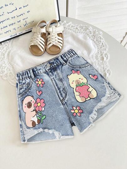 SHEIN Sparklyn Tween Girls' Heavily Washed Cartoon Patchwork Print Distressed Casual Denim Shorts