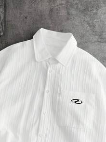 AXEPEAK Camisa casual de manga corta con estampado de letras, de corte holgado y de solapa única para hombres - Blanco - Ver 6