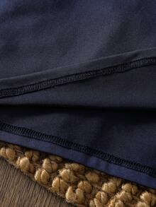 Bộ đồ ngủ 2 món cho bé gái tuổi teen, màu xanh navy thanh lịch, cổ tròn, viền ren ở cổ tay và gấu áo, tay ngắn và quần in họa tiết kẻ caro xanh trắng, thoải mái và thường ngày. - Màu xanh lam - Xem 11