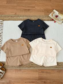 SHEIN Bộ 6 món áo thun ngắn tay và quần short trơn màu cơ bản cho trẻ em, thích hợp cho mùa xuân/hè, trang phục cho bé trai, quần áo đi học. - Màu be - Xem 5
