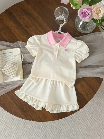 Baby Girls' Sweet & Cute Minimalist Polo Collar Short Sleeve T-Shirt With Bow Embroidery Decoration, Paired With Ruffle Hem Shorts, Casual Outfit Set