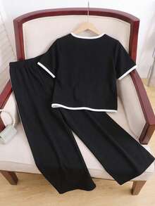 SHEIN Bộ đồ đôi cho bé gái tuổi teen gồm áo sơ mi ngắn tay cổ chữ V phối màu tương phản và quần dài, thích hợp cho mùa tựu trường, thanh lịch khi đi làm, nữ tính. - Đen và trắng - Xem 2