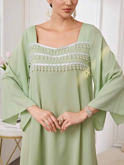 Al Najma Women's Elegant Sheer Long Sleeve Pearl Tassel Decor Loose Casual Arabic Style Dress