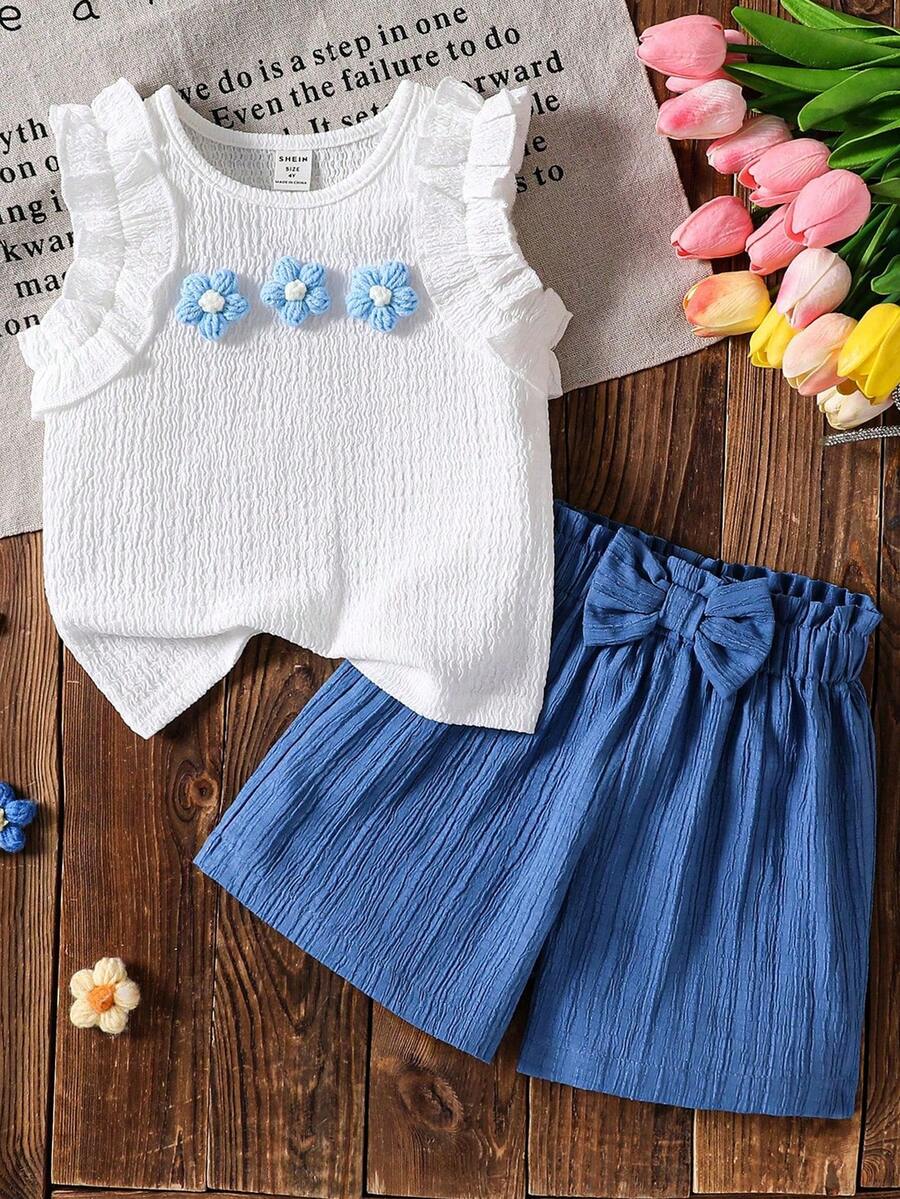 SHEIN Elladie kids مجموعة ملابس علوية كامي بطبعة جاكارد أيفوري مع تريم كشكش وشورت كشكش وردي، طقم صيفي جميل وجذاب للطفلة الصغيرة، تنورة زرقاء فاتحة، طقم ملابس أزرق وأبيض 2 قطعة، ملابس صيفية بطراز كلاسيكي للفتاة الصغيرة، طقم صيفي من قطعتين للأطفال، طقم ملابس أطفال من قطعتين، طقم شورت بطراز كلاسيكي جميل للأطفال - الأزرق - مشاهدة 1