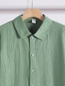 SHEIN Áo sơ mi nam tuổi teen tay ngắn, màu trơn, cài cúc phía trước, chất liệu vải có họa tiết, kiểu dáng thường ngày, thích hợp cho mùa hè. - xanh quân đội - Xem 6