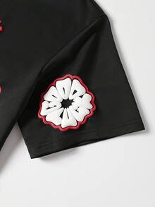 Manfinity Hypemode Camiseta de manga corta casual de cuello redondo con gráfico de letras y flores para hombres - Negro - Ver 6