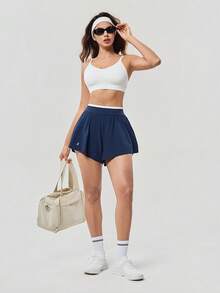 OutZeal 女士健身短裤 运动短裤 网球跑步内置短裤 撞色飘逸下摆 运动裤 - Dark Blue - 查看 6