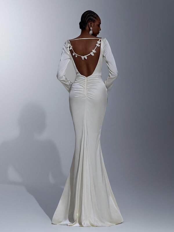 Elitara Elegant Minimalist Cream Satin Long Sleeve Pleated Front, Sexy Open Back Ruffle Trim Mermaid Hem Formal Gown, Evening Dress, Party Dress