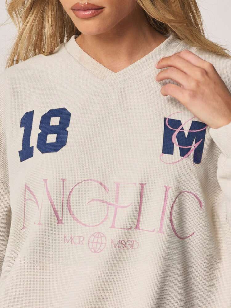 MISSGUIDED Damska bluza z długim rękawem i dekoltem w serek, teksturowanym wzorem waflowym, oversize'owym, z anielską grafiką Varsity