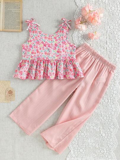 两件套女童碎花荷叶边吊带背心和纹理休闲裤套装，春夏新款，适合生日派对、日常穿着、度假等场合，是年轻女孩春夏服装的理想之选。