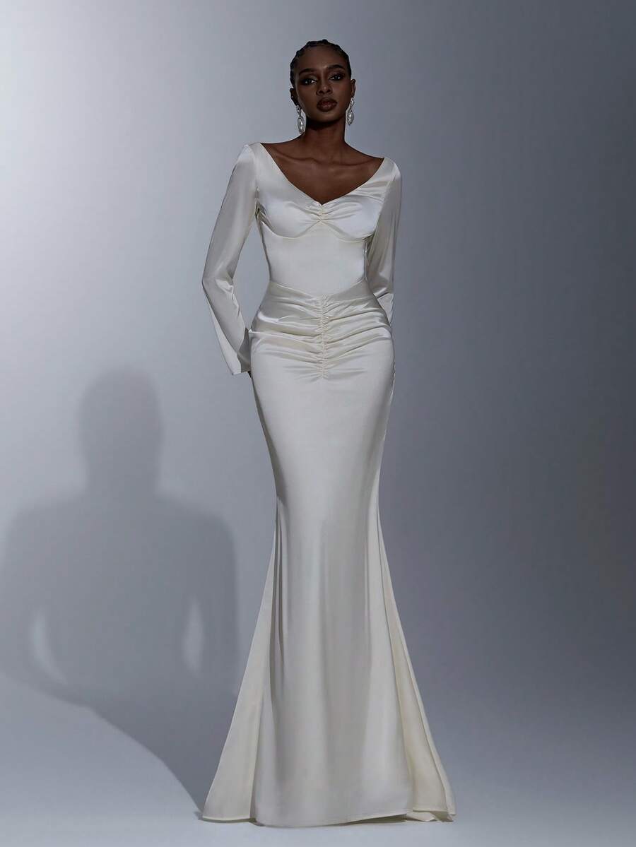 Elitara Elegant Minimalist Cream Satin Long Sleeve Pleated Front, Sexy Open Back Ruffle Trim Mermaid Hem Formal Gown, Evening Dress, Party Dress - Apricot - View 1