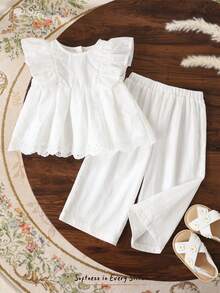 Cozy Pixies Set de 2 piezas de top sin mangas con estampado floral ditsy y pantalones casuales sueltos para niña bebé. Conjunto de 2 piezas de ropa para niñas con estampado floral. Conjunto de falda y top con lazo para niña bebé en estilo vintage. Conjunto de falda con estampado floral y top con lazo para niña bebé. Conjunto de 2 piezas de top con lazo y falda floral para niña. Conjunto coordinado de niña. Conjunto de falda y ropa para niña bebé. - Multicolor - Ver 6
