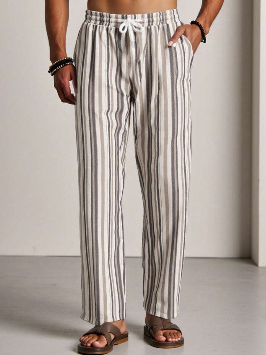 HIMLAND Quần dài nam kẻ sọc dáng rộng, có dây rút, thích hợp cho việc đi làm hàng ngày.