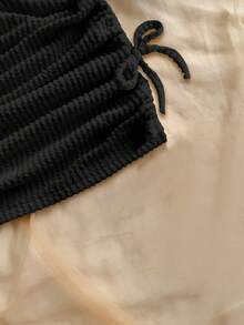 SHEIN Conjunto de 2 piezas de top sin mangas y falda asimétrica holgada, informal y minimalista para niña preadolescente - Negro - Ver 6
