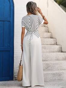 Breezaya 女士夏季法式休闲度假极简V领短袖交叉系带腰部长款条纹印花休闲连体裤 - 杏色 - 查看 2