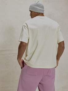 Musero Áo thun cổ tròn dáng rộng tay ngắn vai rớt in họa tiết, kiểu dáng thiết yếu cho mùa xuân và hè. - Màu be - Xem 2