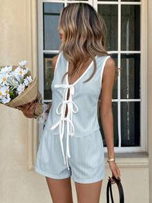 SHEIN LUNE Bộ 2 món áo croptop và quần short nữ, kiểu dáng vintage kẻ sọc màu xanh navy, áo hai dây buộc eo gợi cảm, thích hợp cho mùa xuân/hè, hoạt động ngoài trời, kỳ nghỉ, bãi biển, phong cách sành điệu. - Nhiều màu - Xem 4