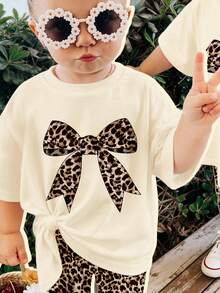 SHEIN Ensemble t-shirt à manches courtes col rond ample et leggings pour bébé fille, motif nœud imprimé léopard beige et rétro, convient pour le printemps/été - Multicolore - Voir 4