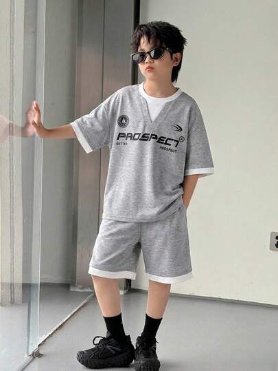 2件套青少年男童休闲二合一短袖T恤短裤套装，适合通勤、上学、日常休闲穿着、运动、春夏穿着。