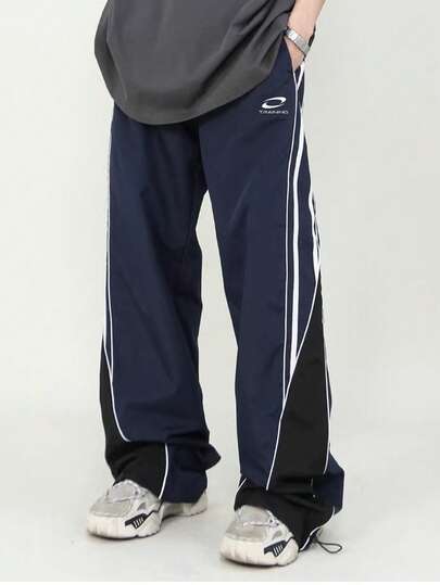 Manfinity Sport Corelite Men's Casual Sports Pants With Strap Design And Small Prints, Comfortable And Versatile