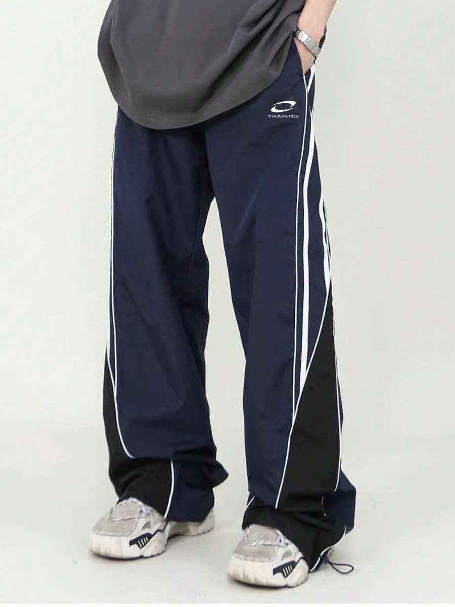 Manfinity Sport Corelite Men's Casual Sports Pants With Strap Design And Small Prints, Comfortable And Versatile