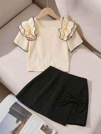 SHEIN Girls' Black & White Casual Two Pieces Set: Ruffled Top + Skirt Chic Pearl Details, Soft Fabric. Versatile For Playdates, Family Outings, Casual Parties Or Weekend Hangouts. Easy To Match-Ideal Daily/Leisure Wear For Big Kids.