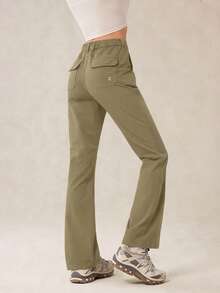 OutZeal Pantalones para mujer para exteriores de unicolor, resistentes al agua, elásticos, de nailon, de pierna acampanada y ajustados, para camping y senderismo, para primavera y verano - Caqui - Ver 6