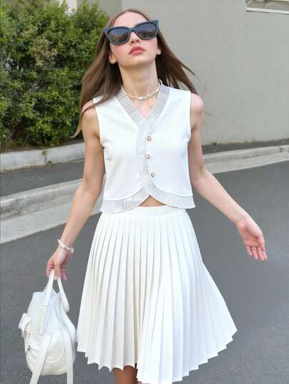 Conjunto de 2 piezas para niñas preadolescentes con estilo francés y preppy, que incluye un chaleco sin mangas blanco y una falda plisada