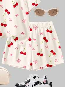Bộ áo thun và quần short cổ tròn tay ngắn màu trắng kem, nơ retro ngọt ngào, họa tiết hoa anh đào và hoa nhí, phong cách tối giản thoải mái, mềm mại, phù hợp cho bé gái tuổi teen mặc hàng ngày vào mùa xuân/hè, phong cách đường phố, đi chơi, ở nhà, đi nghỉ mát. - Nhiều màu - Xem 6