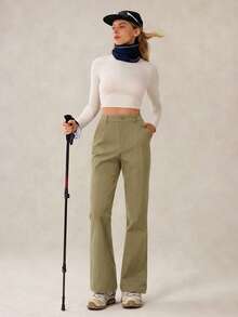 OutZeal Pantalones para mujer para exteriores de unicolor, resistentes al agua, elásticos, de nailon, de pierna acampanada y ajustados, para camping y senderismo, para primavera y verano - Caqui - Ver 9