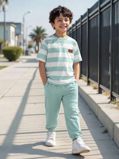 SHEIN Vacaura Set de 2 piezas Camiseta a rayas en blanco y negro y pantalones negros de estilo minimalista casual para adolescentes, adecuado para uso diario y salidas en primavera, verano y otoño