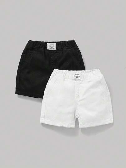 SHEIN Set de 2 pantalones cortos vaqueros elásticos de verano y primavera para bebés niños con bolsillo con parche de letras en estilo bohemio casual, ropa de verano para bebés