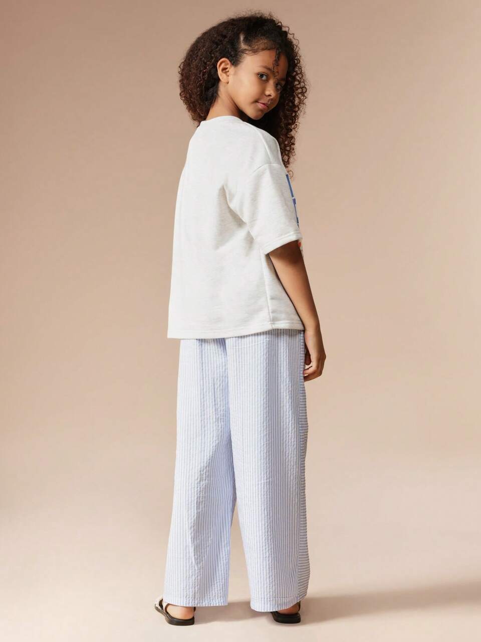 Conjunto de camiseta e calça palazzo listrada Fruit Market
