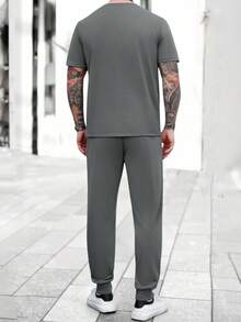 Manfinity Homme Men's Short Sleeve Crew Neck Zip-Up T-Shirt + Drawstring Pants Set, Grey T-Shirt Set, Casual Minimalist Style, Suitable For Daily Wear Casual Two Piece Set Men Mens Jogging Outfits Men Summer Sweatsuit Mens Street Wear Sets Men Joggers Suit Old Money,Daily Leisure, Weekend Trips, Outdoor Activities, Travel Expeditions, Relaxed Work Environments Or Semi-Formal Occasions, Boyfriend/Husband Gift, Anniversary /Birthday Gift Party Summer Vacation Holiday New Years Wedding Valentine's Day - Dark Grey - View 2