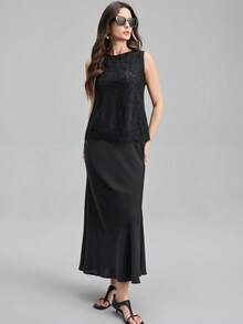 Ontre 2026春夏蕾丝编织面料无袖上衣，适合度假浪漫之旅，采用纹理蕾丝面料，设计细节丰富，宽松版型，纽扣开襟，适合办公室/商务休闲、独立日、都市时尚、简约通勤和婚礼宾客等场合，拼接流苏下摆，宽松舒适，时尚百搭的女士背心。 - 黑色 - 查看 4