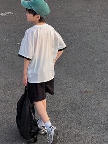 SHEIN 2pcs Tween Boy Black And White Contrast Color Block Pocket Round Neck Short Sleeve T-Shirt And Cargo Shorts Set,Back-To-School Summer Casual School - Black - View 2