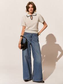 Poéselle New Spring/Autumn Korean Style Commuting Chic Butterfly Metal Buckle Women Knit Top - Black and White - View 1