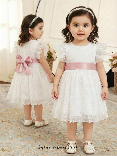 Cozy Pixies Baby Girl/Toddler Girl Contrast Color Ribbon Bow Tie White Mesh Embroidered Round Neck Ruffle Trim Puff Sleeve Waist Cinched Cute Princess Dress, Suitable For Wedding, Valentine's Day, Holiday, Party, Outing, Street Style, Leisure, Home, Sweet & Adorable Princess Style, Multi-Occasion Lace Baby Dress Elegant Baby Dress Party Baby Dress Baby Girl White Dress Baby Girl Summer Dresses Baby Girl White Lace Dress Toddler Elegant Dresses Semi Formal Dress 2 Year Old Baby Girl White Dress With Sash