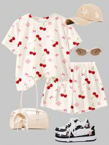 Bộ áo thun và quần short cổ tròn tay ngắn màu trắng kem, nơ retro ngọt ngào, họa tiết hoa anh đào và hoa nhí, phong cách tối giản thoải mái, mềm mại, phù hợp cho bé gái tuổi teen mặc hàng ngày vào mùa xuân/hè, phong cách đường phố, đi chơi, ở nhà, đi nghỉ mát. - Nhiều màu - Xem 3