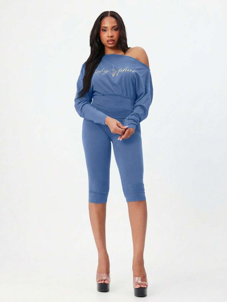 BABYPHAT Top Assimétrica de Manga Longa com Ombro Caído, Estampa de Texto e Cintura Ajustada para Conforto Casual
