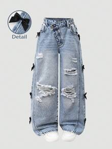SHEIN Quần jeans ống loe rách rưới phong cách vintage dành cho bé gái tuổi teen, có đường xẻ tà phía trước và nơ 3D, kiểu dáng casual đa năng, phù hợp cho mọi mùa. - Rửa trung bình - Xem 3