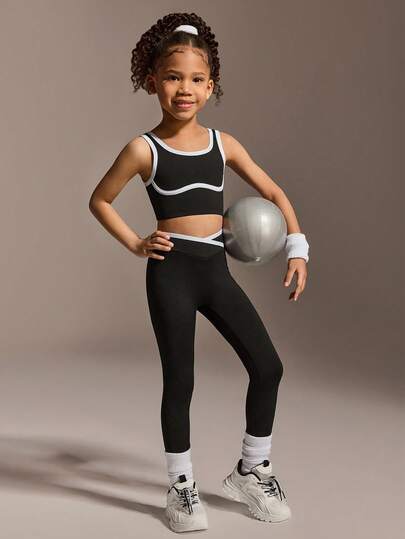 This 2-Piece Black Set For Young Girlis Made Of Soft, Stretchy Fabric, Perfect For Sports Training And Active Play. The Stylish Yet Practical Design Allows For Easy Movement, Making It A Versatile And Comfortable Choice For Various Activities.
