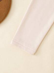 Bộ 2 món đồ lót ôm sát màu mơ dành cho bé gái: áo cổ cao, tay dài và quần legging. - Màu be - Xem 6