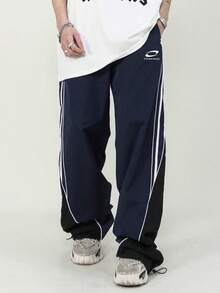 Manfinity Sport Corelite Men's Casual Sports Pants With Strap Design And Small Prints, Comfortable And Versatile